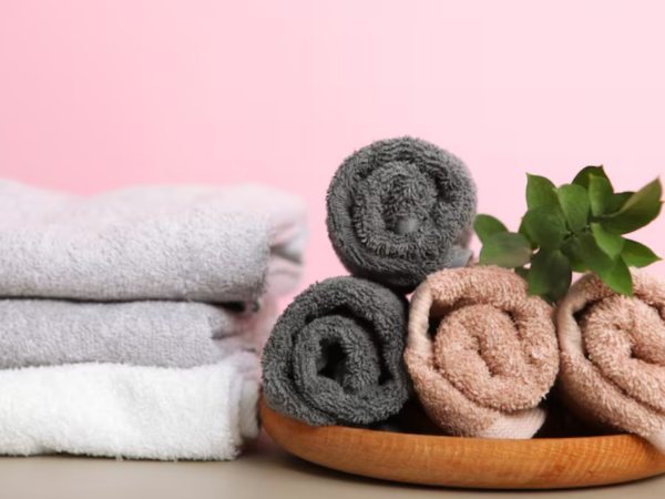 Qual é o melhor material para Toalhas de Banho (algodão egípcio, bambu, microfibra) e como ele afeta sua absorção e maciez?